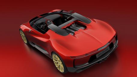 Sleek Red Sports Car with Golden Accents wallpaper