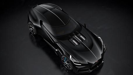 Sleek Black Supercar Wallpaper Design wallpaper