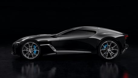 Sleek Black Sports Car on Dark Background wallpaper