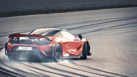 Sleek McLaren in Action on the Track wallpaper