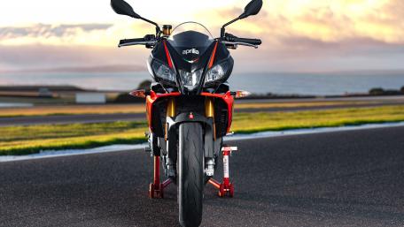 Sleek Red Aprilia Motorcycle Wallpaper wallpaper