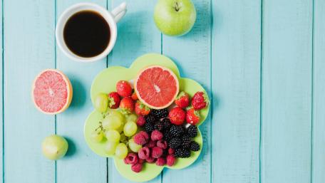 Fresh and Vibrant Fruit Arrangement with Coffee wallpaper