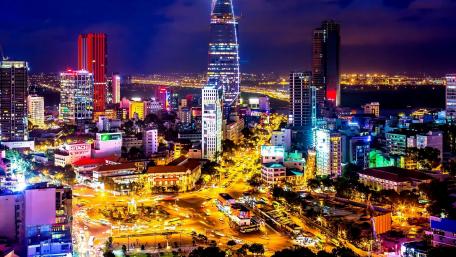 Vibrant Night Cityscape with Skyscrapers and Lights wallpaper