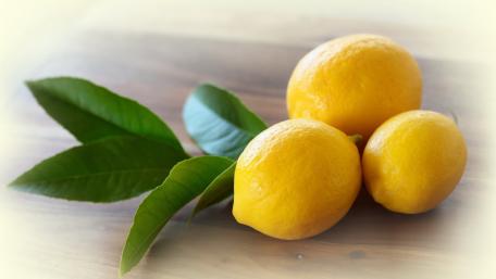 Fresh Lemons in Vibrant Yellow Hue wallpaper