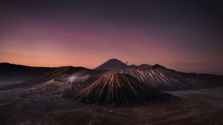 Majestic Volcano Under a Purple Sky wallpaper