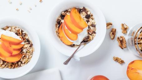 Delicious Breakfast Cereal Bowl with Fresh Fruits wallpaper