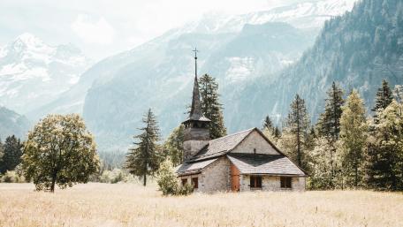 Serenity of a Mountain Temple in Nature's Embrace wallpaper