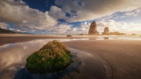 Serenity at the Beach with Majestic Boulders wallpaper