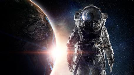 Astronaut Bathed in Cosmic Light wallpaper
