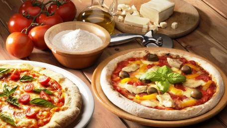 Delicious Pizza Ingredients Ready for Cooking wallpaper