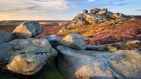 Majestic Boulders Amidst Scenic Landscape Views wallpaper