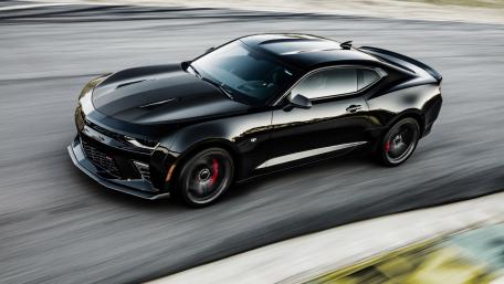 Sleek Black Sports Car for Speed Enthusiasts wallpaper