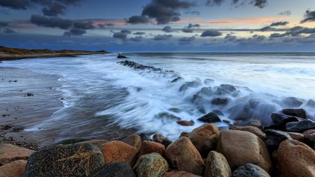 Tranquil Waves and Rocky Shores wallpaper