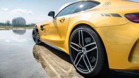 Vibrant Yellow Sports Car Wallpaper wallpaper