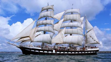 Majestic Sailing Ship Under Clear Sky wallpaper