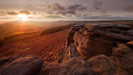 Serene Sunset Over Majestic Hillside Landscape wallpaper