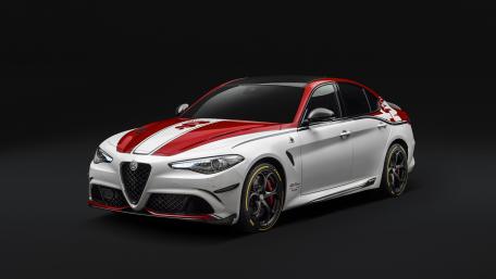 Sleek Alfa Romeo Giulia in Bold Red and White Design wallpaper