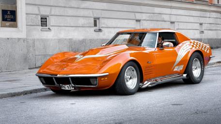 Vintage Orange Sports Car Wallpaper wallpaper