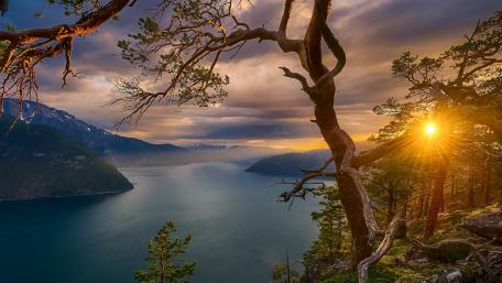 Serene Fjord Sunset Over Tranquil Waters wallpaper