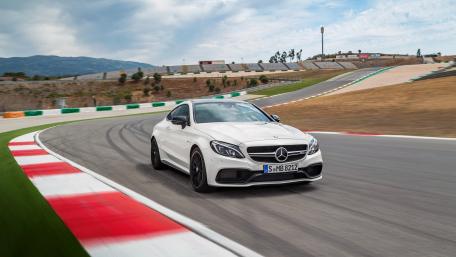 Sleek Mercedes Racing on Track Adventure wallpaper