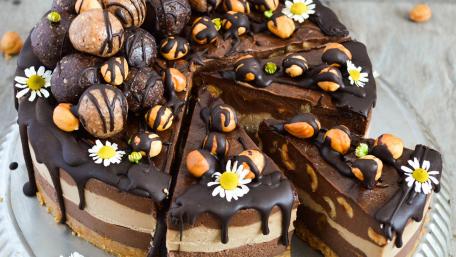 Indulge in Decadent Chocolate Cake Delightful Layers of Flavor and Texture wallpaper