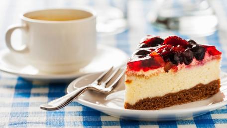 Delicious Berry-Topped Cheesecake with Coffee wallpaper