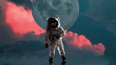 Futuristic Astronaut Journey on the Moon's Surface wallpaper
