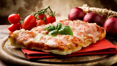 Delicious Homemade Pizza with Fresh Ingredients wallpaper