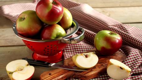 Fresh Apples in a Vibrant Scene with a Cutting Board wallpaper