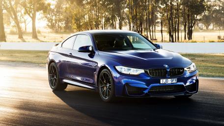 Sleek Blue BMW Coupe on the Track wallpaper