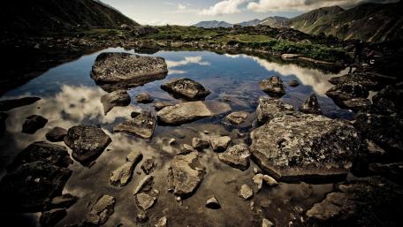Serene Reflection in Nature's Embrace wallpaper