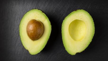 Avocado Delight Fresh and Creamy Sliced Avocado Wallpaper for Your Space wallpaper
