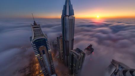 Misty Skyline at Dawn over the Cityscape wallpaper