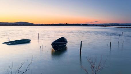 Serene Sunset Over Calm Waters wallpaper