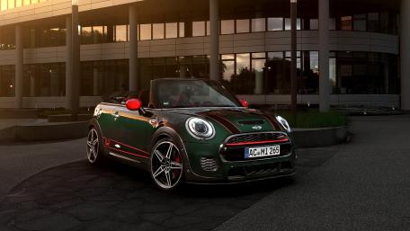 Sleek Mini Cooper Convertible in Urban Setting wallpaper