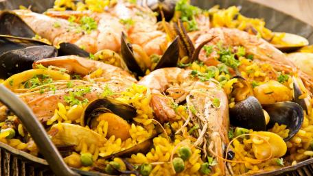 Delicious Seafood Paella Delightful Feast for Seafood Lovers wallpaper