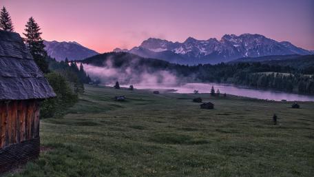 Serene Mountains and Misty Lake Scene wallpaper