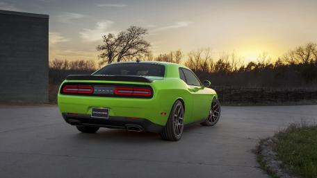 Vibrant Dodge Challenger in Sunset Glow wallpaper
