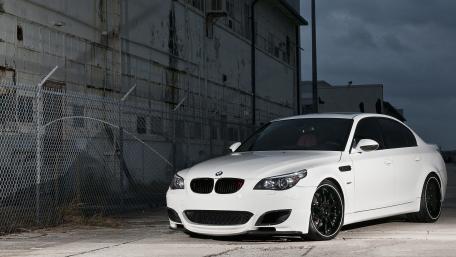 Sleek White BMW in Urban Setting wallpaper