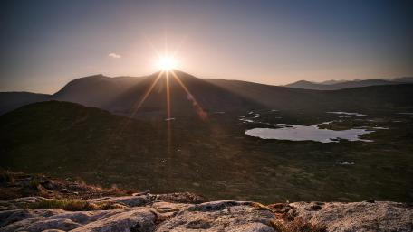 Majestic Sunrise Over Serene Landscapes wallpaper