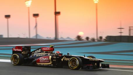 Dynamic Formula One Sunset Race Wallpaper wallpaper