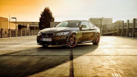 Sleek BMW Coupe at Sunset Glow wallpaper