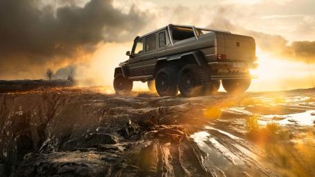 Powerful Off-Road Adventure Vehicle Against a Dramatic Sky wallpaper