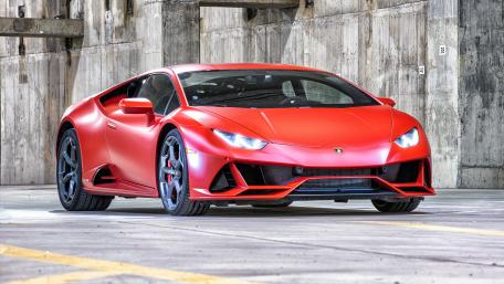 Sleek Red Lamborghini Huracan EVO Coupe Wallpaper wallpaper