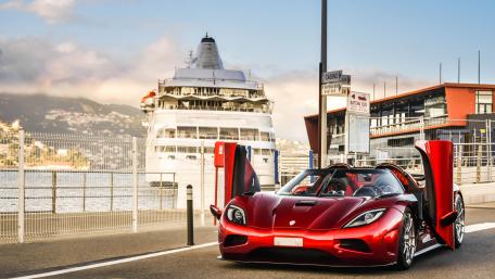 Dreamy Red Koenigsegg Agera Under Serene Skies wallpaper