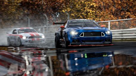 Revving Engines on Rainy Tracks wallpaper