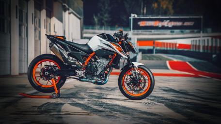 Sleek Motorcycle on the Race Track wallpaper