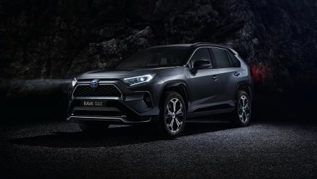 Sleek Toyota RAV4 SUV in Stunning Dark Setting wallpaper