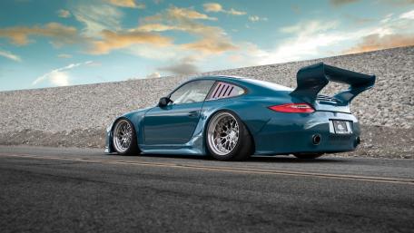 Sleek Blue Porsche 911 Wallpaper Design wallpaper