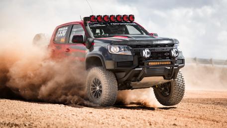 Powerful Off-Road Truck in Action wallpaper